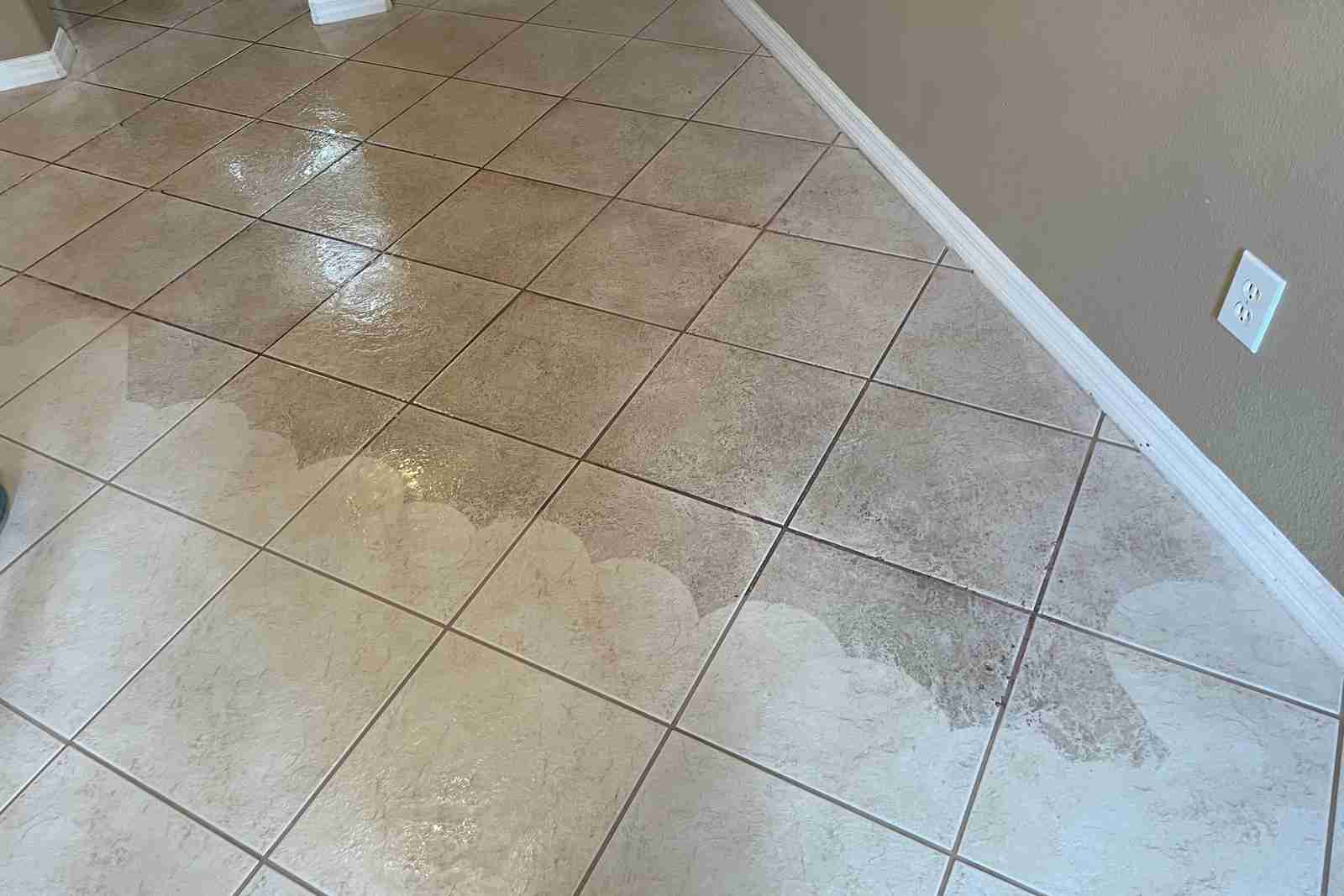 HomeProud Inc cleaning a floor on a job in Orlando